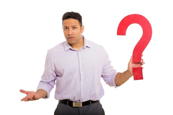 Man holding a question mark sign